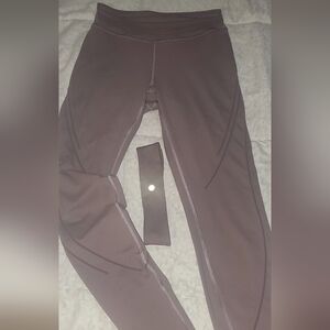 LULULEMON light purple leggings and matching headband.